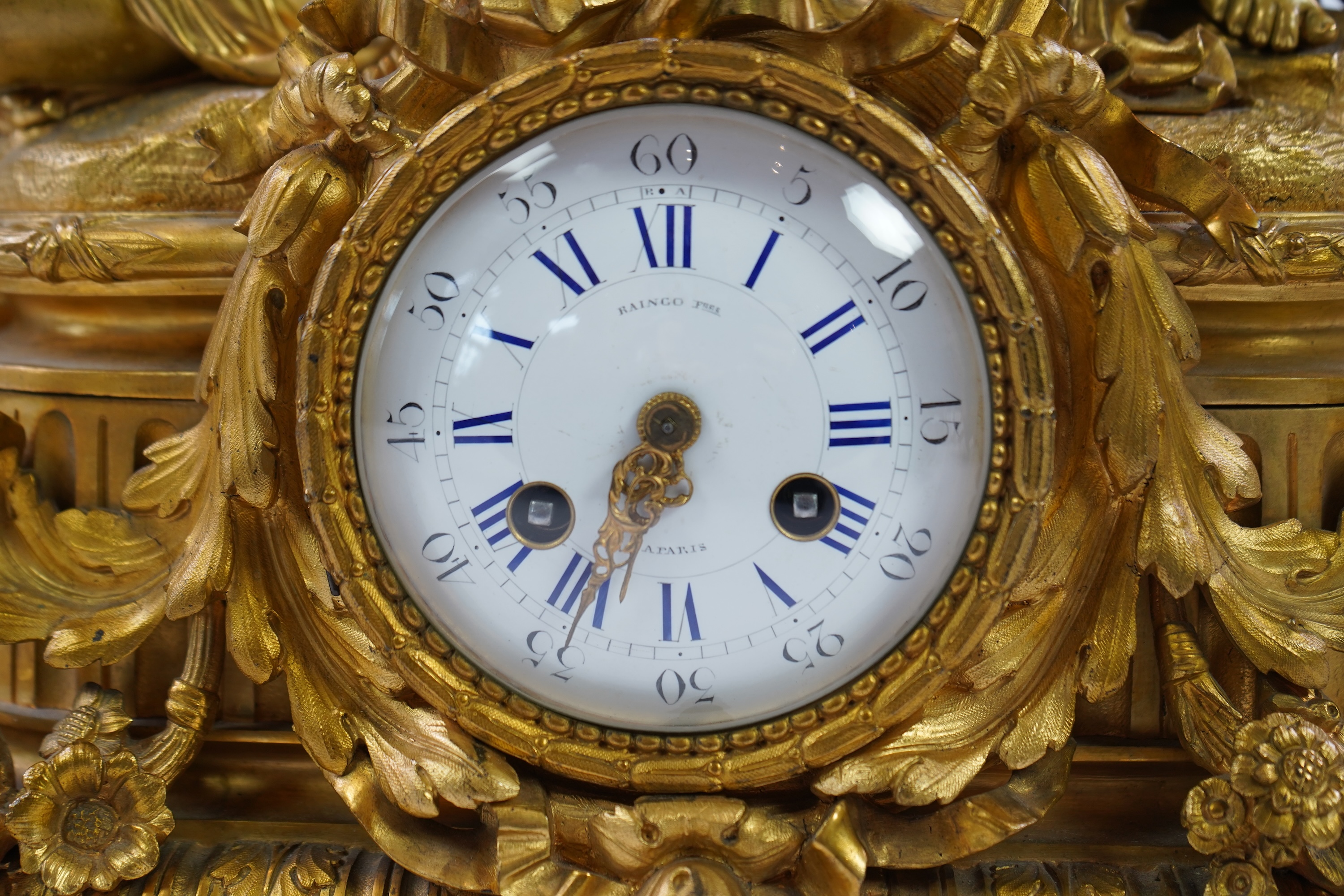 A late 19th century French gilt bronze figural mantel clock